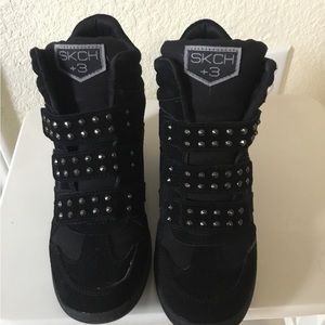Skechers Hidden Wedge Black boot with metal Studs. Size 6.5.